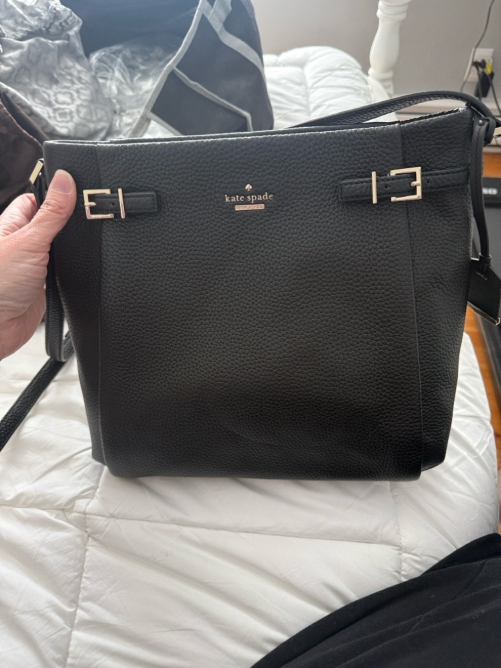 kate spade brown dust bag with yellow logo and quote